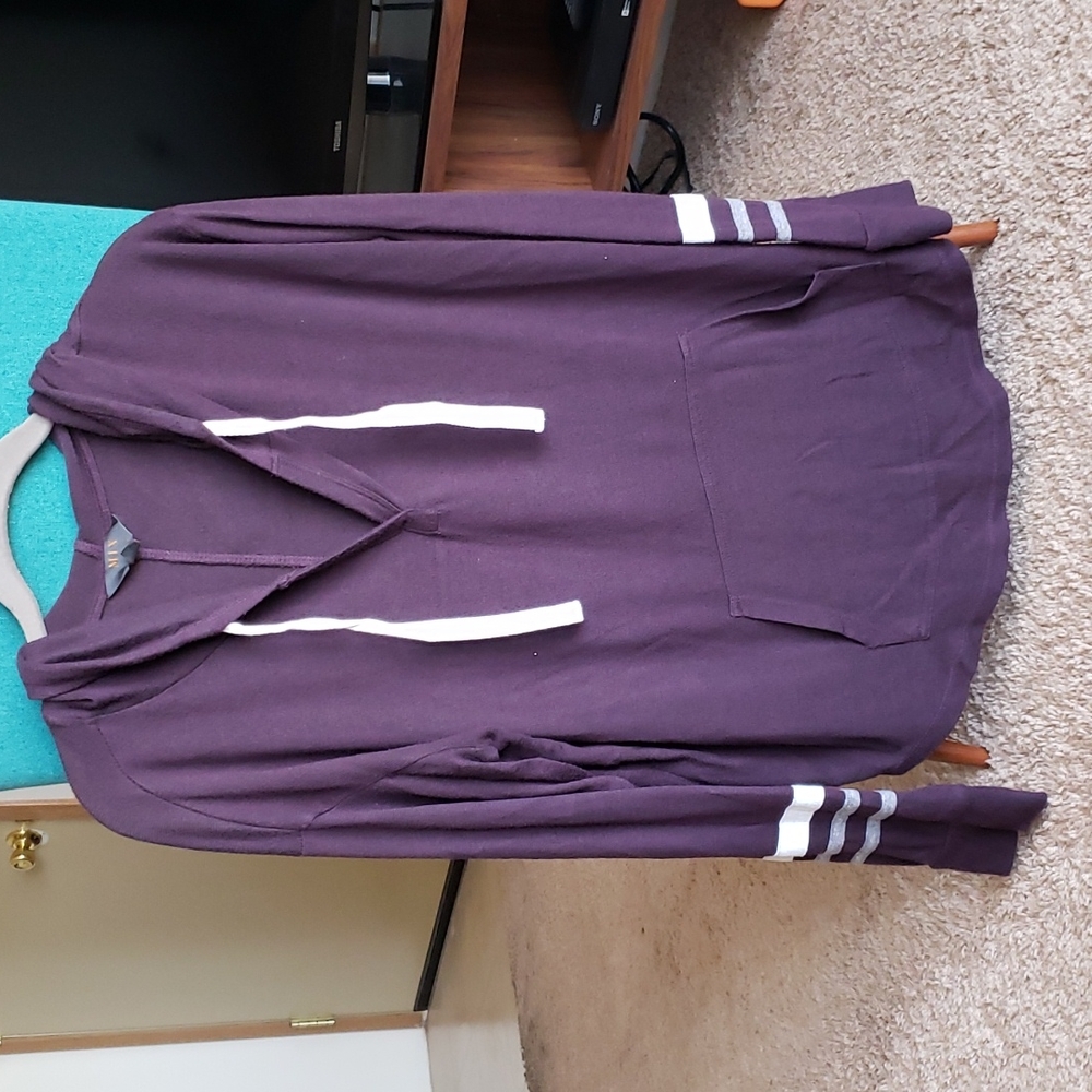 Long-sleeve, light-weight shirt with a hoodie.